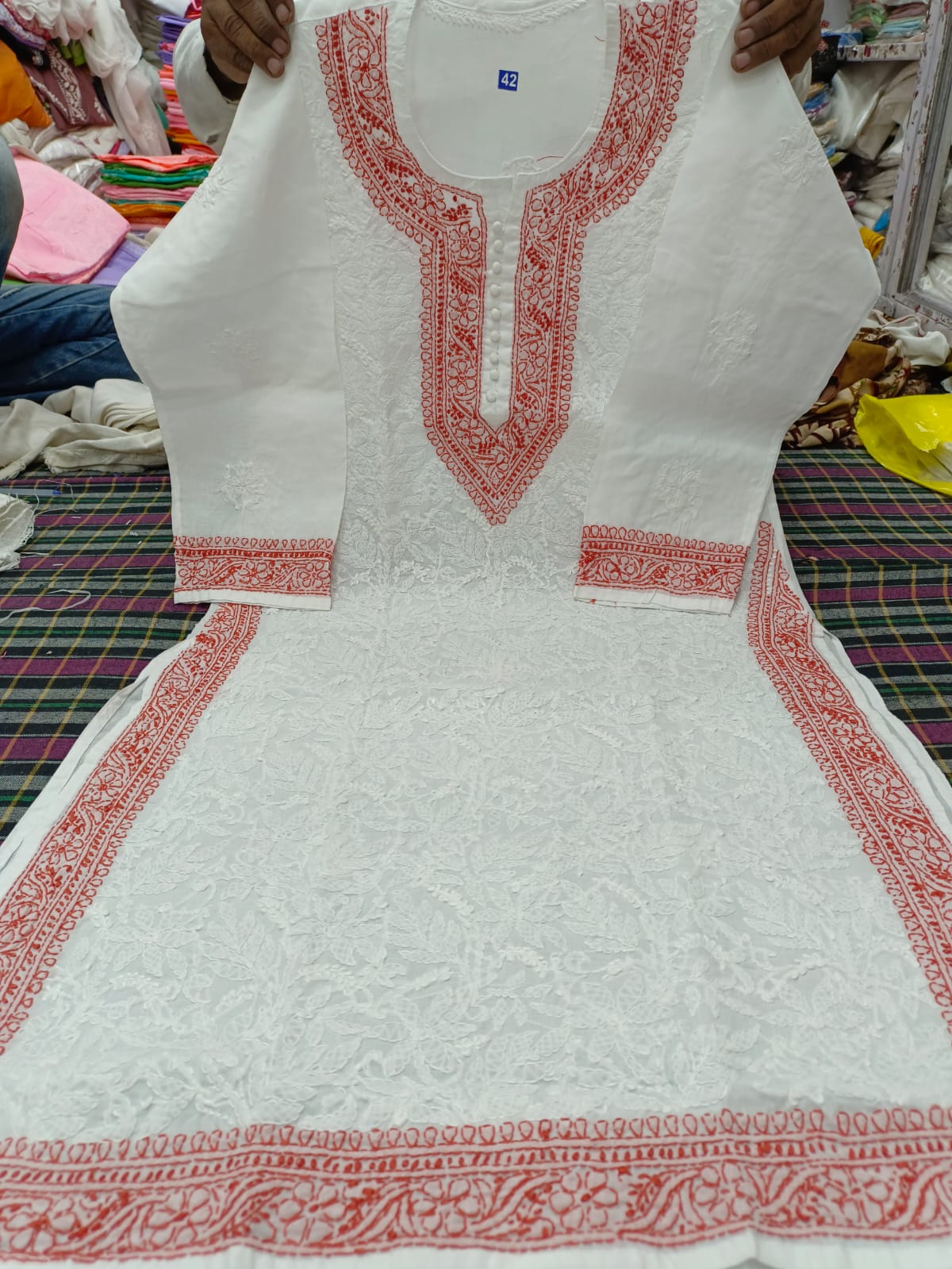 Voil cotton kurta with color thread chikankari on neck Daman and seleaves