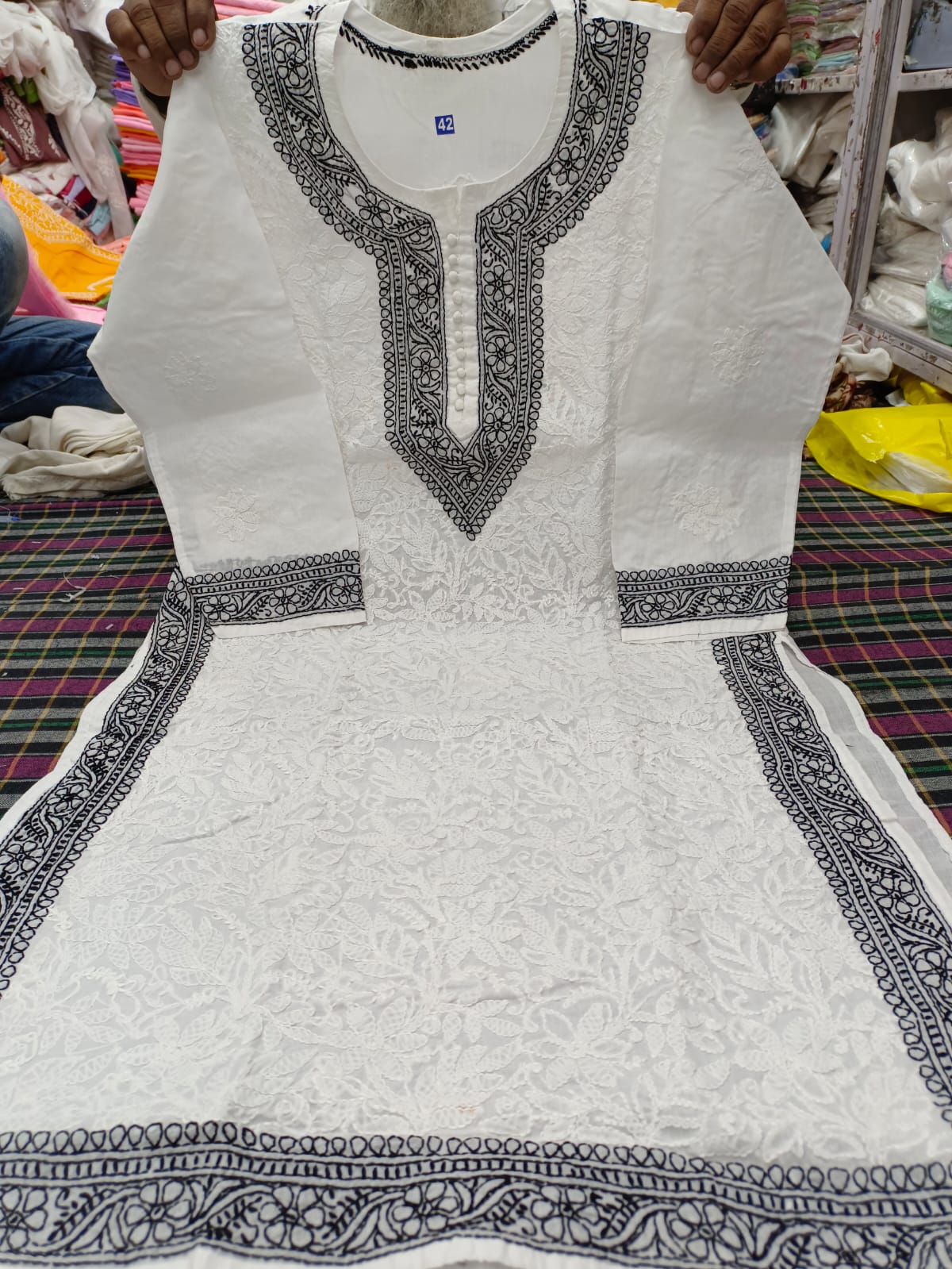 Voil cotton kurta with color thread chikankari on neck Daman and seleaves